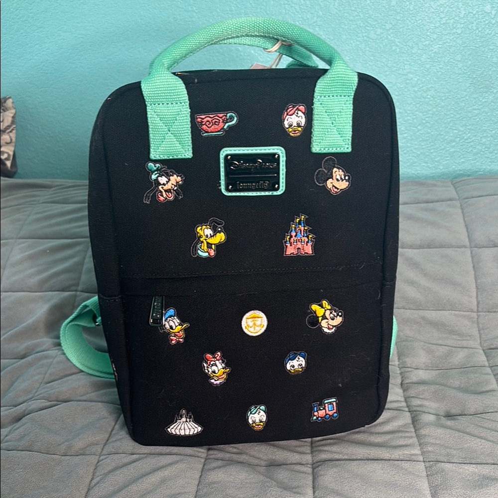 Loungefly Disney Parks 2024 Mickey and Friends Castle Canvas backpack